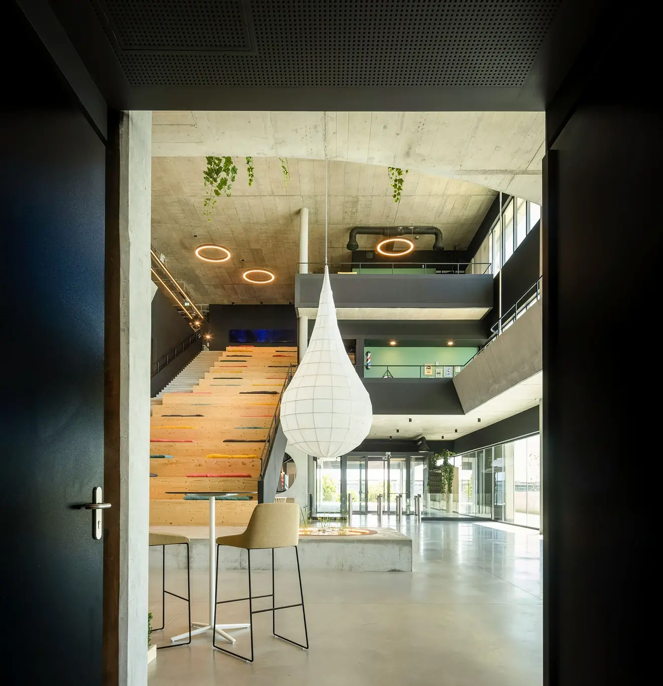 A modern workspace in Portugal. The employer-of-record route makes you an employee; opening a company makes you the owner. They are different legal relationships, and they carry different visas