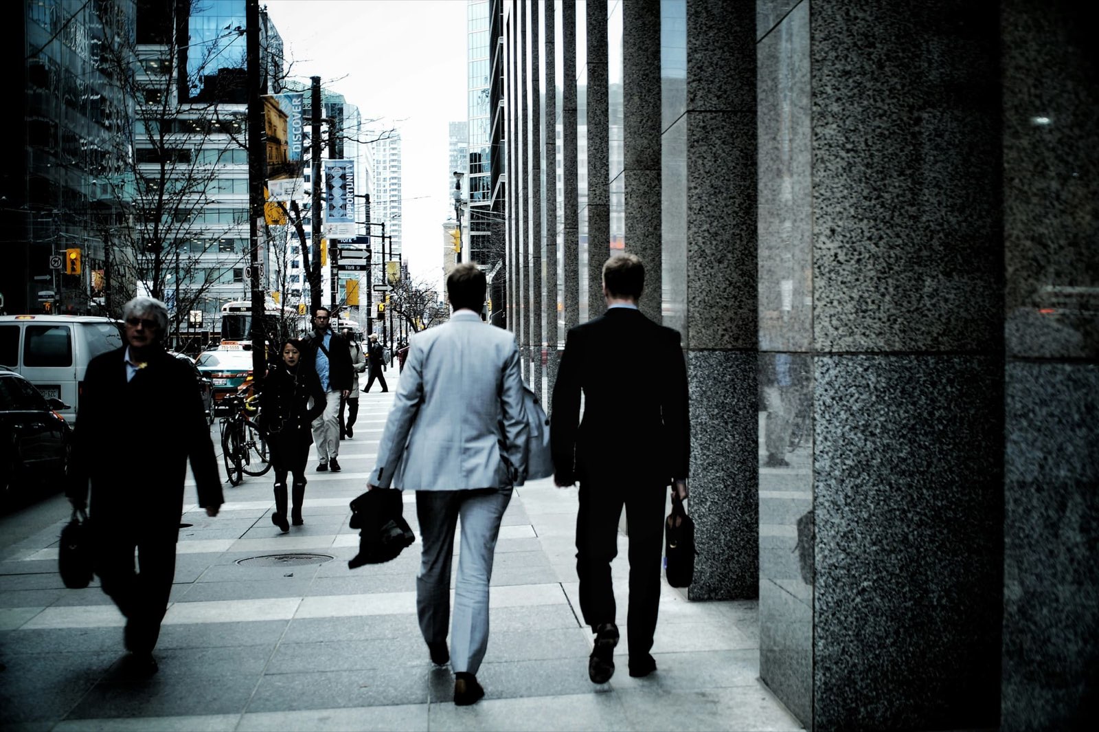 Job seekers walking through a German city centre